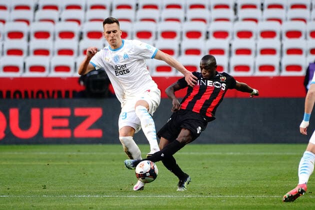 Arkadiusz Milik (Olympique de Marseille) - Hassane Kamara (OGC Nice) FOOTBALL : OGC Nice vs Marseille - Ligue 1 Uber Eats - Nice - 20 03 2021 NorbertScanella PanoramiC 