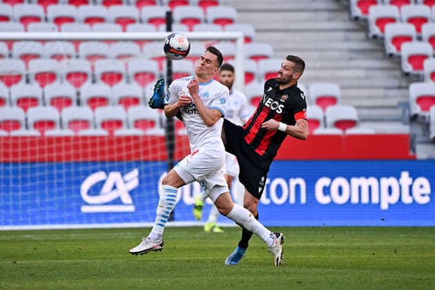 06 MORGAN SCHNEIDERLIN (NICE) - 19 ARKADIUSZ KRYSTIAN MILIK (OM) FOOTBALL : Nice vs Marseille - Ligue 1 Uber Eats - 20 03 2021 FEP Panoramic 