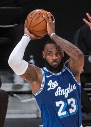 March 20, 2021, Los Angeles, California, USA: Lebron James suffers a high right ankle sprain in the Lakers 99-94 loss to the Atlanta Hawks. FILE PHOTO: LeBron James 23 of the Los Angeles Lakers looks to pass the ball during their regular season NBA, Basketball Herren, USA game with the Minnesota Timberwolves on Tuesday March 16, 2021 at the Staples Center in Los Angeles, California. Lakers defeat Timberwolves, 137-121. PI Los Angeles USA - ZUMAp124 20210320_zaa_p124_009 Copyright: xJAVIERxROJASx