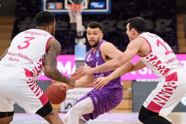 BG Göttingen Telekom Baskets Bonn 21 03 2021, Basketball Bundesliga easyCredit BBL, 2020 2021 season, Hauptrunde, 24 Spieltag, BG Göttingen Telekom Baskets Bonn Göttingens Luke Nelson M plays against Bonns James Thompson IV and Bonns Anthony DiLeo Göttingen Lower Saxony Germany.