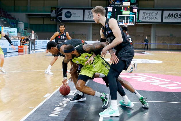 24 Matchday of the easyCredit BBL Basketball Bundesliga on 21 March 2021in the Oberfrankenhalle in Bayreuth Bavaria Germany Season 2020 2021 Medi Bayreuth against NINERS Chemnitz Dererk Pardon Medi Bayreuth 0 center Isiaha Mike NINERS Chemnitz 11 left Jan Niklas Wimberg NINERS Chemnitz 8 right