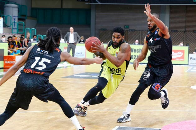 24 Matchday of the easyCredit BBL Basketball Bundesliga on 21 March 2021in the Oberfrankenhalle in Bayreuth Bavaria Germany Season 2020 2021 Medi Bayreuth vs NINERS Chemnitz Lazeric Jones Medi Bayreuth 12 center Virgil Matthews NINERS Chemnitz 4 right Marcus Thornton NINERS Chemnitz 15 left
