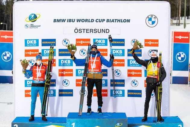 210321 Eduard Latypov of Russia second place, Simon Desthieux of France first place, and, Johannes Thingnes Bo of Norway third place celebrate on the podium after the Men s 15 km Mass Start during the IBU Biathlon World Cup on March 21, 2021 in Östersund Photo Joel Marklund BILDBYRAN code JM JM0089 bbeng biathlon biathlon biathlon world cup ibu world cup mass start cheers norway norway france russia,  Copyright: JOELxMARKLUND BB210321JM186