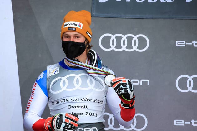 ALPINE SKIING - FIS WC Final Lenzerheide LENZERHEIDE,SWITZERLAND,21.MAR.21- ALPINE SKIING - FIS World Cup Final, men, award ceremony for the overall World Cup. Image shows the rejoicing of Marco Odermatt (SUI). Keywords: medal. GEPAxpictures xMarioxBuehner