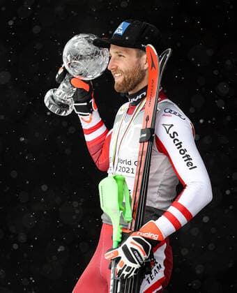 ALPINE SKIING - FIS WC Final Lenzerheide LENZERHEIDE,SWITZERLAND,21.MAR.21- ALPINE SKIING - FIS World Cup Final, slalom, men. Image shows Marco Schwarz (AUT). Keywords: crystal globe, medal. GEPAxpictures xHaraldxSteiner