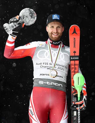ALPINE SKIING - FIS WC Final Lenzerheide LENZERHEIDE,SWITZERLAND,21.MAR.21- ALPINE SKIING - FIS World Cup Final, slalom, men. Image shows Marco Schwarz (AUT). Keywords: crystal globe, medal. GEPAxpictures xHaraldxSteiner