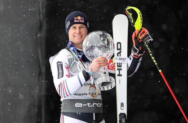 ALPINE SKIING - FIS WC Final Lenzerheide LENZERHEIDE,SWITZERLAND,21.MAR.21- ALPINE SKIING - FIS World Cup Final, men, award ceremony for the overall world cup. Image shows Alexis Pinturault (FRA). Keywords: crystal globe, medal. GEPAxpictures xHaraldxSteiner