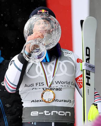 ALPINE SKIING - FIS WC Final Lenzerheide LENZERHEIDE,SWITZERLAND,21.MAR.21- ALPINE SKIING - FIS World Cup Final, men, award ceremony for the overall world cup. Image shows Alexis Pinturault (FRA). Keywords: crystal globe, medal. GEPAxpictures xHaraldxSteiner