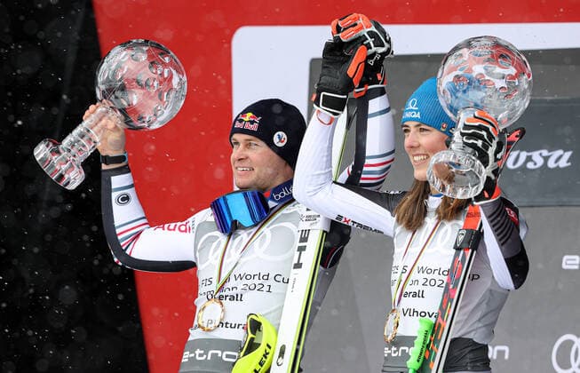 ALPINE SKIING - FIS WC Final Lenzerheide LENZERHEIDE,SWITZERLAND,21.MAR.21- ALPINE SKIING - FIS World Cup Final, ladies, men, award ceremony for the overall world cup. Image shows Alexis Pinturault (FRA) and Petra Vlhova (SVK). Keywords: crystal globe, medal. GEPAxpictures xHaraldxSteiner