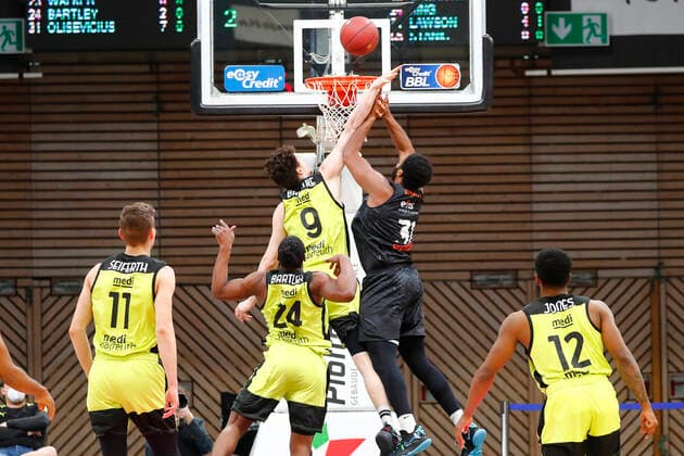 24 Matchday of the easyCredit BBL Basketball Bundesliga on 21 March 2021in the Oberfrankenhalle in Bayreuth Bavaria Germany Season 2020 2021 Medi Bayreuth vs NINERS Chemnitz Kay Bruhnke Medi Bayreuth 9 left Joseph Lawson III NINERS Chemnitz 31 right