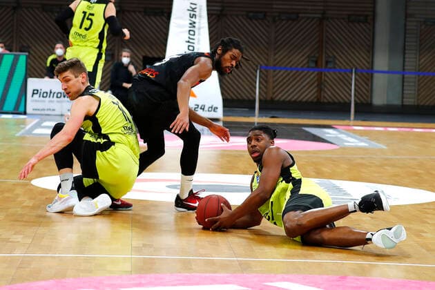 24 Matchday of the easyCredit BBL Basketball Bundesliga on 21 March 2021in the Oberfrankenhalle in Bayreuth Bavaria Germany Season 2020 2021 Medi Bayreuth vs NINERS Chemnitz Andreas Seiferth Medi Bayreuth 11 left Frank Bartley Medi Bayreuth 24 right Marcus Thornton NINERS Chemnitz 15 center