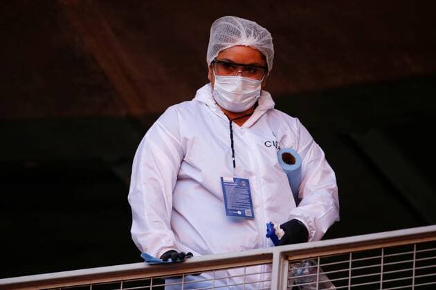 Health personnel disinfect the Akron stadium facilities as a preventive measure against Covid-19 during a CONCACAF Men s Olympic Qualifying tournament soccer match between the Dominican Republic and the United States, at the Akron stadium, in Guadalajara, Jalisco, Mexico, 21 March 2021. Dominican Republic vs US !ACHTUNG: NUR REDAKTIONELLE NUTZUNG!  Copyright: xFranciscoxGuascox AME4379 20210322-637519766358316985
