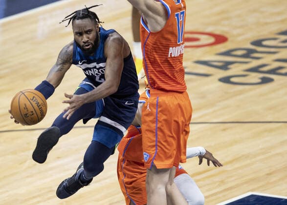 March 22, 2021, Minneapolis, MN, United States: Jaylen Nowell (4) of the Minnesota Timberwolves passes the ball in the fourth quarter on March 22, 2021 at the Target Center in Minneapolis. Minneapolis United States - ZUMAm67_ 0115792004st Copyright: xCarlosxGonzalezx