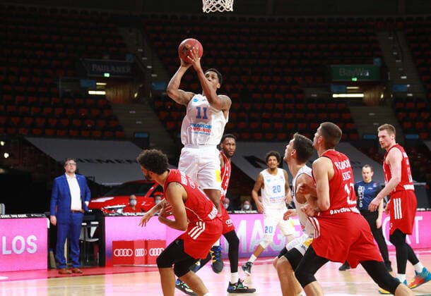 0 Nick Weiler Babb FCBB red, against 11 Kyndahl Hill with ball Mitteldeutscher BC Basketball, 1 Bundesliga, BBL, FC Bayern Munich Mitteldeutscher BC at Audi Dome on 23 03 2021 PHOTO Mladen Lackovic LakoPress