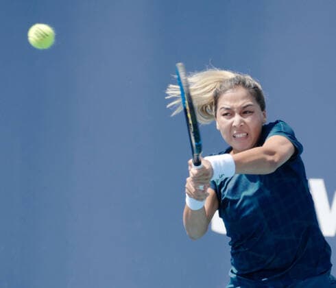Zarina Diyas from Kazakhstan returns serve to Venus Williams from the USA on the stadium court at the Miami Open in the Hard Rock Stadium in Miami Gardens, Florida, Tuesday, March 23, 2021. Diyas defeated Williams in a tie breaker 6-2, 7-6 (12-10).  MIA20210323119 GARYxIxROTHSTEIN