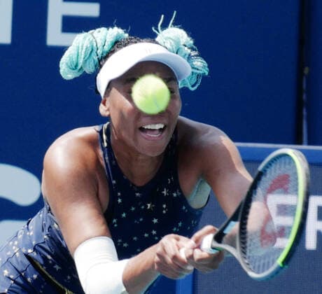 Venus Williams from the USA returns serve to Zarina Diyas from Kazakhstan on the stadium court at the Miami Open in the Hard Rock Stadium in Miami Gardens, Florida, Tuesday, March 23, 2021. Diyas defeated Williams in a tie breaker 6-2, 7-6 (12-10).  MIA20210323122 GARYxIxROTHSTEIN