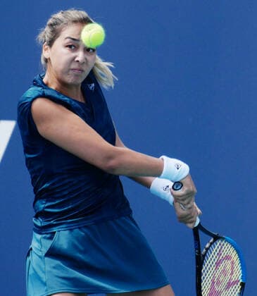 Zarina Diyas from Kazakhstan returns serve to Venus Williams from the USA on the stadium court at the Miami Open in the Hard Rock Stadium in Miami Gardens, Florida, Tuesday, March 23, 2021. Diyas defeated Williams in a tie breaker 6-2, 7-6 (12-10).  MIA20210323124 GARYxIxROTHSTEIN