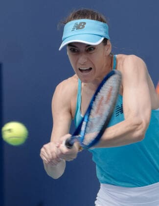 Sorana Cirstea from Romania returns serve to Katrina Scott from the USA on the stadium court at the Miami Open in the Hard Rock Stadium in Miami Gardens, Florida, Tuesday, March 23, 2021. Cirstea defeated Scott 6-2, 6-2.  MIA20210323128 GARYxIxROTHSTEIN