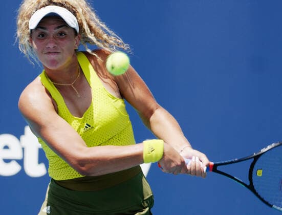 Katrina Scott from the USA returns the ball to Sorana Cirstea from Romania on the stadium court at the Miami Open in the Hard Rock Stadium in Miami Gardens, Florida, Tuesday, March 23, 2021. Cirstea defeated Scott 6-2, 6-2.  MIA20210323136 GARYxIxROTHSTEIN