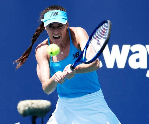 Sorana Cirstea from Romania returns the ball to Katrina Scott from the USA returns the ball to on the stadium court at the Miami Open in the Hard Rock Stadium in Miami Gardens, Florida, Tuesday, March 23, 2021. Cirstea defeated Scott 6-2 6-2.  MIA20210323138 GARYxIxROTHSTEIN