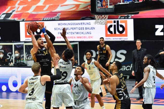 Chemnitz, Germany 24 March 2021 BBL 2020 2021 Niners Chemnitz vs Basketball Loewen Braunschweig from left in the duel Jan Niklas Wimberg Chemnitz , Gavin Schilling Braunschweig , Johnathan Lee Williams Chemnitz and George King Chemnitz Chemnitz Fair Chemnitz Saxony Copyright: xFotostandx xDostmannx