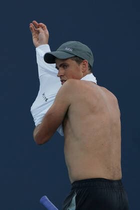 MIAMI GARDENS, FL - MARCH 24: Vasek Pospisil (CAN) changes his shirt during the first round match of the Miami Open on March 24, 2021, at Hard Rock Stadium in Miami Gardens, Florida. (Photo by Michele Sandberg Icon Sportswire) TENNIS: MAR 24 Miami Open Icon2103240269