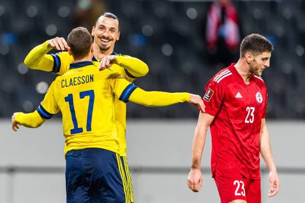 210325 Viktor Claesson and Zlatan Ibrahimovic of Sweden celebrate after 1 0 during the FIFA World Cup Qualifier football match between Sweden and Georgia on March 25, 2021 in Stockholm Photo Jesper Zerman BILDBYRAN COP 234 JM0097 bbeng fotboll football soccer fotball vm kval kval fifa world cup qualifier qualifier landskamp sverige sweden sverige a georgia georgien jubel,  Copyright: JESPERxZERMAN BB210325JZ035