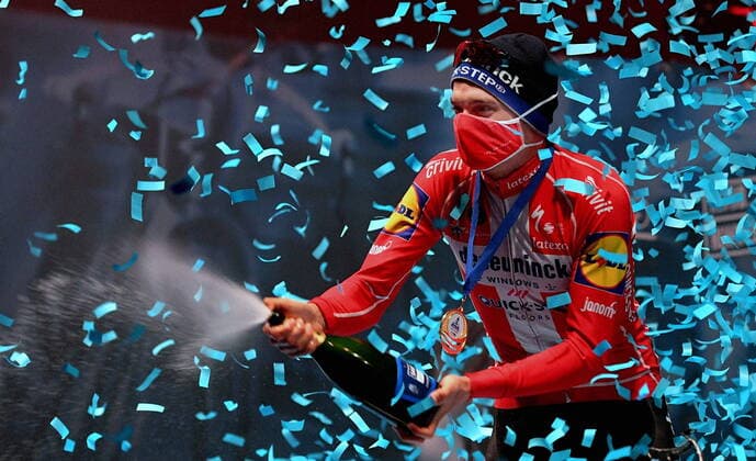 Bilder des Jahres 2021, Sport 03 März Sport Themen der Woche KW12 Sport Bilder des Tages Winner Danish Kasper Asgreen of Deceuninck - Quick-Step celebrates on the podium with champagne after the E3 Saxo Bank Classic cycling race, 203, 9km from and to Harelbeke, Friday 26 March 2021. BELGA PHOTO DAVID STOCKMAN , HARELBEKE Denmark *** Winner Danish Kasper Asgreen of Deceuninck Quick Step celebrates on the podium with champagne after the E3 Saxo Bank Classic cycling race, 203, 9km from and to Harelbeke, Friday 26 March 2021 BELGA PHOTO DAVID STOCKMAN, HARELBEKE Denmark  Copyright: DAVIDxSTOCKMANx cop102 spdk20210326-175841-L