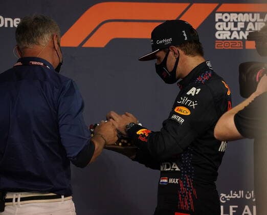 Formula 1 Gulf Air Bahrain Grand Prix 2021 27 03 2021, Bahrain International Circuit, Sakhir, Formula 1 Gulf Air Bahrain Grand Prix 2021 ,in picture Max Verstappen NEL 33 , Red Bull Racing Honda presents a cake to David Coulthard for his 50th birthday nordphotoxGmbHx xBratic nph00250