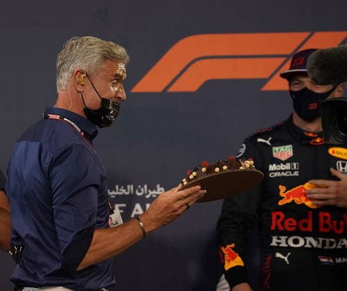 Formula 1 Gulf Air Bahrain Grand Prix 2021 27 03 2021, Bahrain International Circuit, Sakhir, Formula 1 Gulf Air Bahrain Grand Prix 2021 ,in picture Max Verstappen NEL 33 , Red Bull Racing Honda presents David Coulthard with a cake for his 50th birthday and throws it in his face nordphotoxGmbHx xBratic nph00250