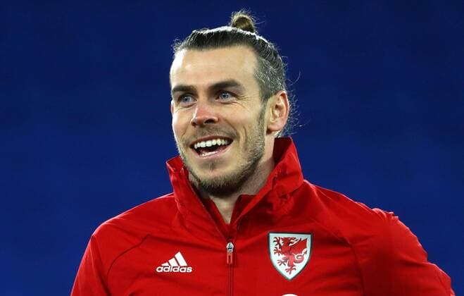 Mandatory Credit: Photo by Kieran McManus BPI Shutterstock (11832375f) Gareth Bale of Wales warms up Wales v Mexico, International Friendly, Länderspiel, Nationalmannschaft Football, The Cardiff City Stadium, Cardiff, UK - 27 Mar 2021 EDITORIAL USE ONLY No use with unauthorised audio, video, data, fixture lists, club league logos or live services. Online in-match use limited to 120 images, no video emulation. No use in betting, games or single club league player publications. Wales v Mexico, International Friendly, Football, The Cardiff City Stadium, Cardiff, UK - 27 Mar 2021 EDITORIAL USE ONLY No use with unauthorised audio, video, data, fixture lists, club league logos or live services. Online in-match use limited to 120 images, no video emulation. No use in betting, games or single club league player publications. Copyright: xKieranxMcManus BPI Shutterstockx 11832375f