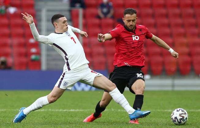 Albania v England 2022 FIFA World Cup, WM, Weltmeisterschaft, Fussball Qualifiers Sokol Cikalleshi of Albania and Phil Foden of England during the 2022 FIFA World Cup Qualifiers match at the Air Albania Stadium, Tirana Content Not Available For UK Newspapers Copyright: xFocusxImagesx FIL-15360-0009