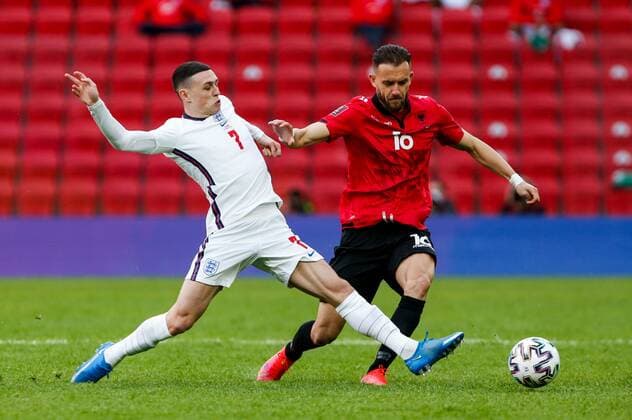 Mandatory Credit: Photo by Nikola Krstic BPI Shutterstock (11832717u) Phil Foden of England and Sokol Cikalleshi of Albania Albania v England, FIFA World Cup, WM, Weltmeisterschaft, Fussball Qualifying Group I, Football, Arena Kombetare, Tirana, Albania - 28 Mar 2021 Albania v England, FIFA World Cup Qualifying Group I, Football, Arena Kombetare, Tirana, Albania - 28 Mar 2021  Copyright: xNikolaxKrstic BPI Shutterstockx 11832717u