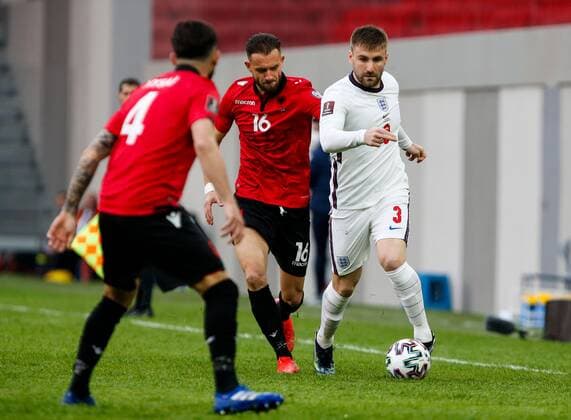 Mandatory Credit: Photo by Nikola Krstic BPI Shutterstock (11832717r) Luke Shaw of England and Sokol Cikalleshi of Albania Albania v England, FIFA World Cup, WM, Weltmeisterschaft, Fussball Qualifying Group I, Football, Arena Kombetare, Tirana, Albania - 28 Mar 2021 Albania v England, FIFA World Cup Qualifying Group I, Football, Arena Kombetare, Tirana, Albania - 28 Mar 2021  Copyright: xNikolaxKrstic BPI Shutterstockx 11832717r