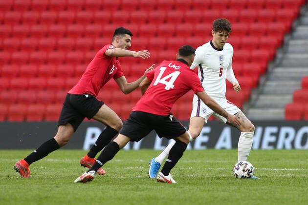 Albania v England 2022 FIFA World Cup, WM, Weltmeisterschaft, Fussball Qualifiers John Stones of England is closed down by Armando Broja and Qazim Laci of Albania during the 2022 FIFA World Cup Qualifiers match at the Air Albania Stadium, Tirana Content Not Available For UK Newspapers Copyright: xFocusxImagesx FIL-15360-0013