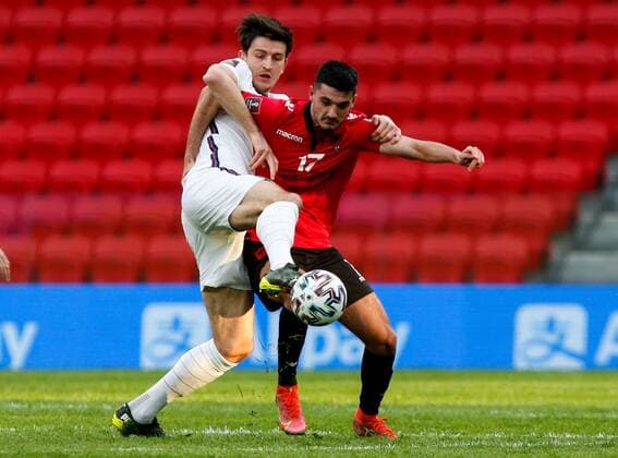 Mandatory Credit: Photo by Nikola Krstic BPI Shutterstock (11832717co) Harry Maguire of England and Armando Broja of Albania Albania v England, FIFA World Cup, WM, Weltmeisterschaft, Fussball Qualifying Group I, Football, Arena Kombetare, Tirana, Albania - 28 Mar 2021 Albania v England, FIFA World Cup Qualifying Group I, Football, Arena Kombetare, Tirana, Albania - 28 Mar 2021  Copyright: xNikolaxKrstic BPI Shutterstockx 11832717co