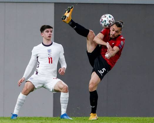 Mandatory Credit: Photo by Nikola Krstic BPI Shutterstock (11832717eb) Freddie Veseli of Albania with Mason Mount of England Albania v England, FIFA World Cup, WM, Weltmeisterschaft, Fussball Qualifying Group I, Football, Arena Kombetare, Tirana, Albania - 28 Mar 2021 Albania v England, FIFA World Cup Qualifying Group I, Football, Arena Kombetare, Tirana, Albania - 28 Mar 2021  Copyright: xNikolaxKrstic BPI Shutterstockx 11832717eb