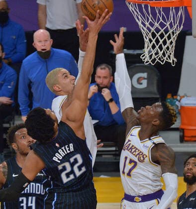 Orlando Magic forward Otto Porter Jr. blocks the shot of Los Angeles Lakers forward Kyle Kuzma during the first half at Staples Center in Los Angeles on Sunday, March 28, 2021. The Lakers defeated the Magic 96-93.  LAP2021032825 JIMxRUYMEN