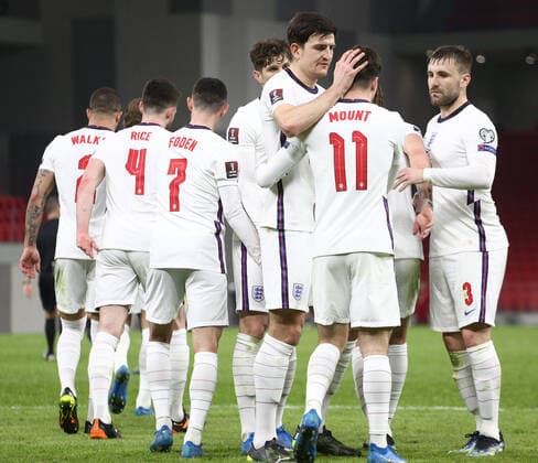 TIRANA, ALBANIA - MARCH 28: Harry Maguire and his team-mates celebrates with Mason Mount after he scores Englands second goal during the FIFA World Cup, WM, Weltmeisterschaft, Fussball 2022 Qatar qualifying match between Albania and England at the Qemal Stafa Stadium on March 28, 2021 in Tirana, Albania. Sporting stadiums around Europe remain under strict restrictions due to the Coronavirus Pandemic as Government social distancing laws prohibit fans inside venues resulting in games being played behind closed doors SPO, SOC, FOI 