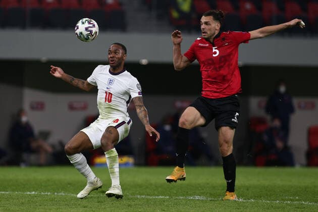 TIRANA, ALBANIA - MARCH 28: Raheem Stelring of England and Freddie Veseli of Albania during the FIFA World Cup, WM, Weltmeisterschaft, Fussball 2022 Qatar qualifying match between Albania and England at the Qemal Stafa Stadium on March 28, 2021 in Tirana, Albania. Sporting stadiums around Europe remain under strict restrictions due to the Coronavirus Pandemic as Government social distancing laws prohibit fans inside venues resulting in games being played behind closed doors SPO, SOC, FOI 