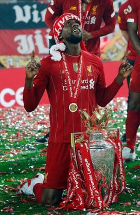 Mandatory Credit: Photo by Magi Haroun Shutterstock (10721050c) Divock Origi of Liverpool with the Premier League trophy Liverpool v Chelsea, Premier League, Football, Anfield, Liverpool, UK - 22 Jul 202 EDITORIAL USE ONLY No use with unauthorised audio, video, data, fixture lists (outside the EU), club league logos or live services. Online in-match use limited to 45 images (+15 in extra time). No use to emulate moving images. No use in betting, games or single club league player publications services. Liverpool v Chelsea, Premier League, Football, Anfield, Liverpool, UK - 22 Jul 202 EDITORIAL USE ONLY No use with unauthorised audio, video, data, fixture lists (outside the EU), club league logos or live services. Online in-match use limited to 45 images (+15 in extra time). No use to emulate moving images. No use in betting, games or Copyright: xMagixHaroun Shutterstockx 10721050c