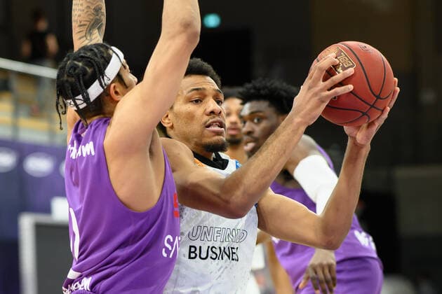 BG Göttingen Niners Chemnitz 30 03 2021, Basketball Bundesliga easyCredit BBL, 2020 2021 season, main round, BG Göttingen Niners Chemnitz George King r plays Göttingens Nelson Weidemann Göttingen Lower Saxony Germany.