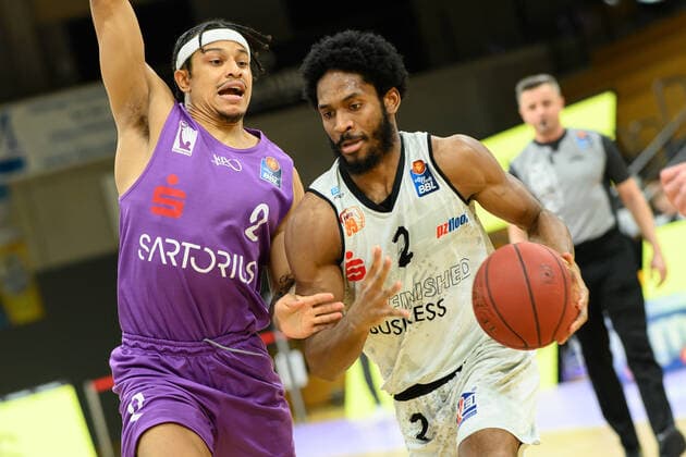 BG Göttingen Niners Chemnitz 30 03 2021, Basketball Bundesliga easyCredit BBL, 2020 2021 season, main round, BG Göttingen Niners Chemnitz Chemnitz Terrell Harris r plays Göttingens Nelson Weidemann Göttingen Lower Saxony Germany.