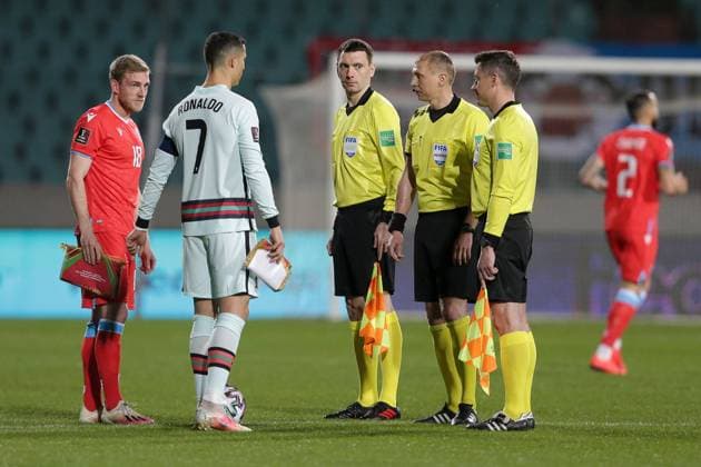 Place vote with Laurent Jans captain Luxembourg 18 , Cristiano Ronaldo Portugal 7 , referee Sergei Ivanov Russia Football, UEFA World Cup Qualifiers 2022, 2020 2021 season, Group A, European Qualifiers 30 03 2021 Luxembourg Portugal Luxembourg vs Portugal Stade Josy Barthel, Luxembourg.
