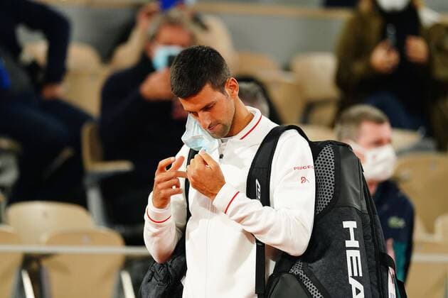 Mandatory Credit: Photo by Javier Garcia BPI Shutterstock (10793954er) Novak Djokovic takes off his mask as he arrives for his Men s Singles first round match French Open Tennis, Day Three, Roland Garros, Paris, France - 29 Sep 2020 French Open Tennis, Day Three, Roland Garros, Paris, France - 29 Sep 2020  Copyright: xJavierxGarcia BPI Shutterstockx 10793954er