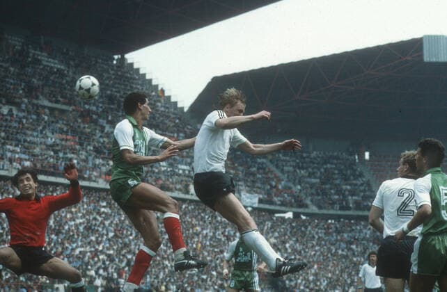 Football World Cup 1982 in Spain Preliminary round Algeria Germany 2 1 16 06 1982 in Gijon Header scene in the penalty area of the Algerians Middle Horst Hrubesch FRG against Nourredine Kourichi Far left Tw Mehdi Cerbah both ALG Re Hans Peter Briegel FRG 2 and Chaabane Merzekane 5 ALG HM