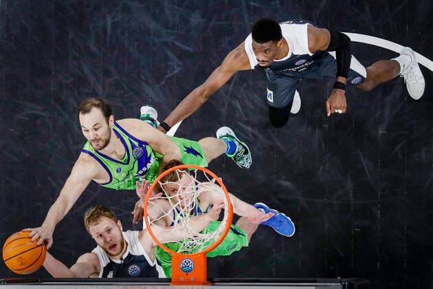 Block from top left 02 Miro Bilan Dinamo Banco di Sardegna Sassari bottom Christian Sengfelder Brose Bamberg, 43 top right Shevon Thompson Brose Bamberg, 27 Basketball Champions League 2020 21, Playoof Matchday 5, Brose Bamberg Dinamo Sassari 01 04 2021, Bamberg, Brose Arena Foto Copyright: DanielxLöb