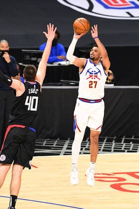 LOS ANGELES, CA - APRIL 01: Denver Nuggets Guard Jamal Murray (27) shoots over Los Angeles Clippers Center Ivica Zubac (40) during a NBA, Basketball Herren, USA game between the Denver Nuggets and the Los Angeles Clippers on April 1, 2021 at STAPLES Center in Los Angeles, CA. The game was played without fans due to the COVID-19 pandemic. (Photo by Brian Rothmuller Icon Sportswire) NBA: APR 01 Nuggets at Clippers Icon210401036