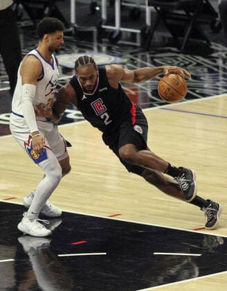 April 1, 2021: The Los Angeles Clippers vs. the Denver Nuggets at Staples Center in Los Angeles, CA on Thursday, April 1, 2021...Kawhi Leonard of the LA Clippers drives to the basket against Jamal Murray of the Denver Nuggets. - ZUMAa60_ 0116288869st Copyright: xPhillipxKimx