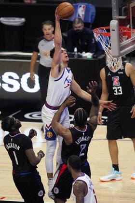 April 1, 2021: The Los Angeles Clippers vs. the Denver Nuggets at Staples Center in Los Angeles, CA on Thursday, April 1, 2021...Michael Porter Jr. of the Denver Nuggets goes for a slam dunk against Kawhi Leonard of the LA Clippers. - ZUMAa60_ 0116289131st Copyright: xPhillipxKimx